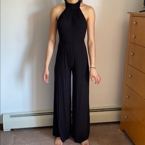 Ribbed high neck open back jumpsuit